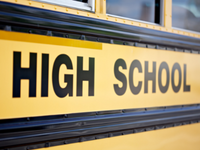  High School on side of bus